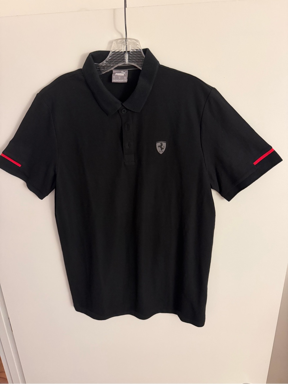 Puma Black Polo with Red Sleeve Stripes and Shield Patch